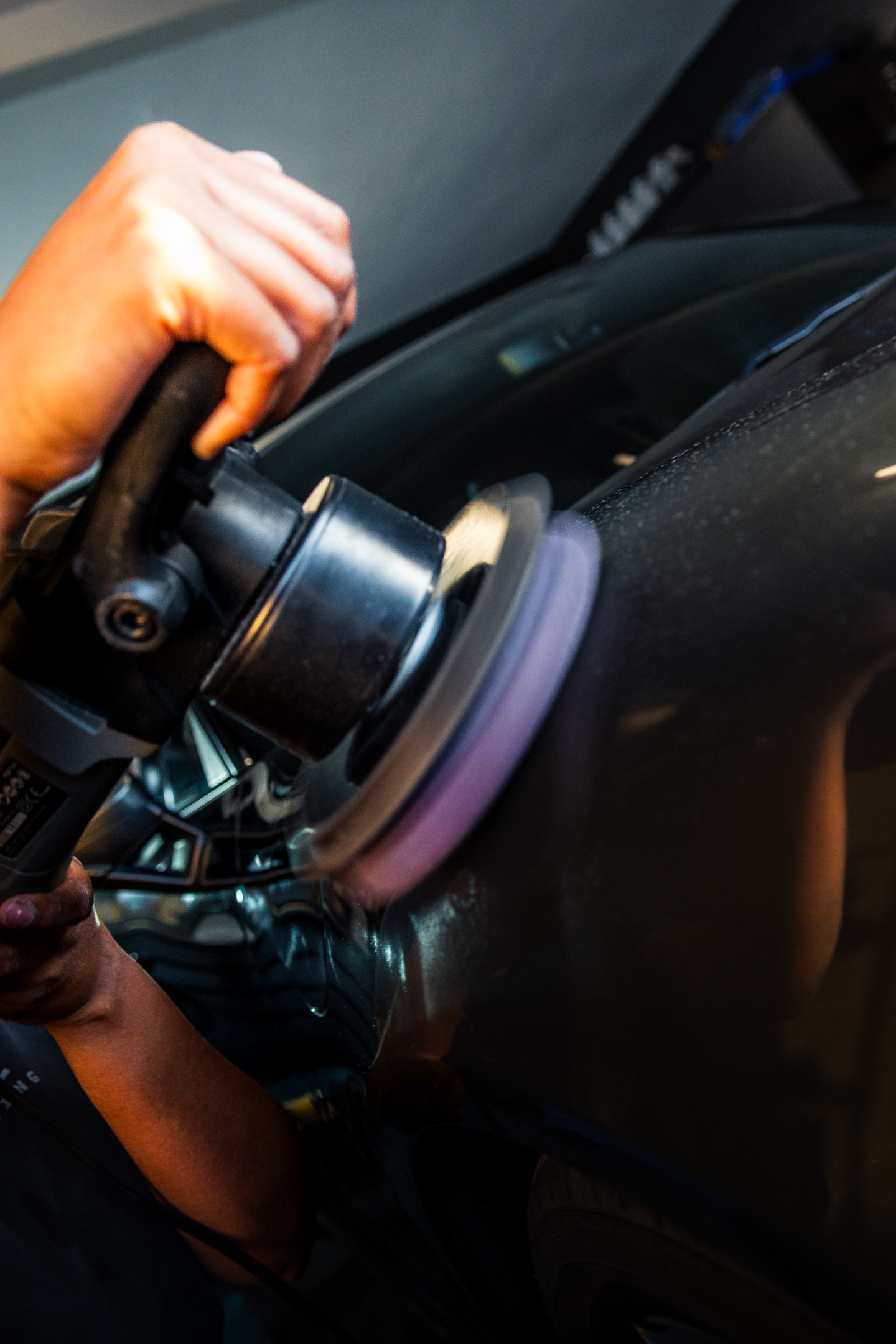Close-up of a polishing pad correcting paintwork